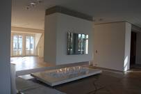 moderne Kamine, Gas oder Holzfeuerung