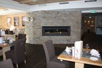 Moderne Kamine mit Gas oder Holz